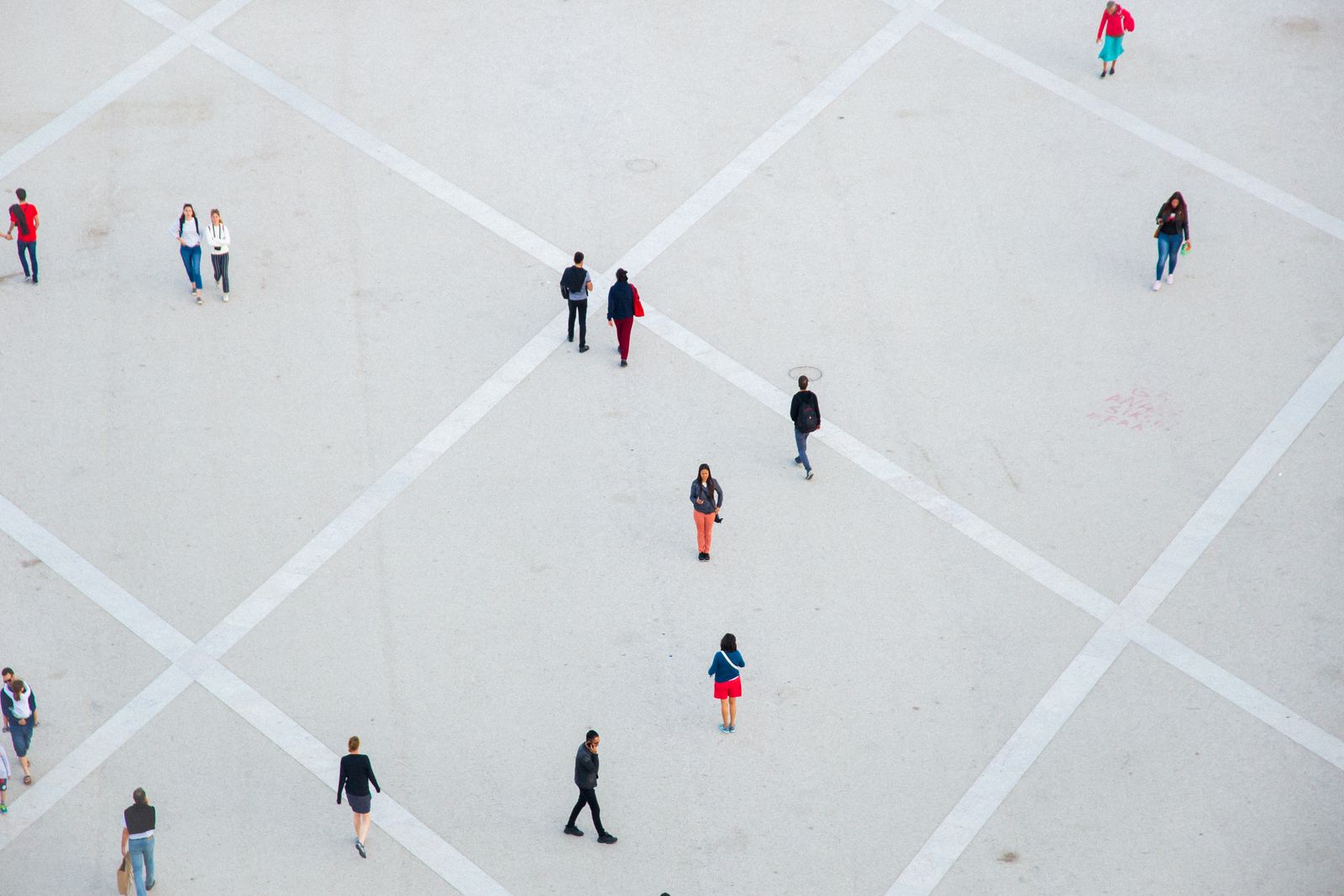 Overhead view of a plaza analyzed by a people-counting model trained for the venue's own floor plan.